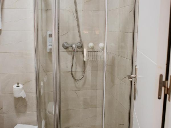 Pensión Mastil 16 : photo 6 de la chambre chambre quadruple