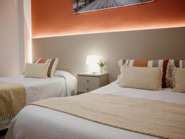 Pensión Mastil 16 : photo 8 de la chambre chambre triple