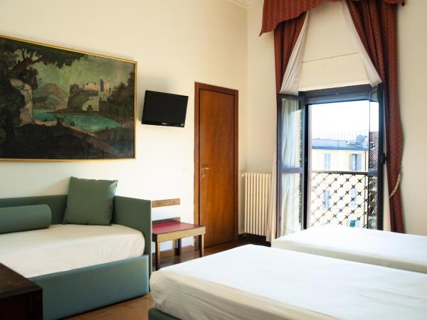Hotel San Guido : photo 1 de la chambre chambre double ou lits jumeaux avec lit d'appoint