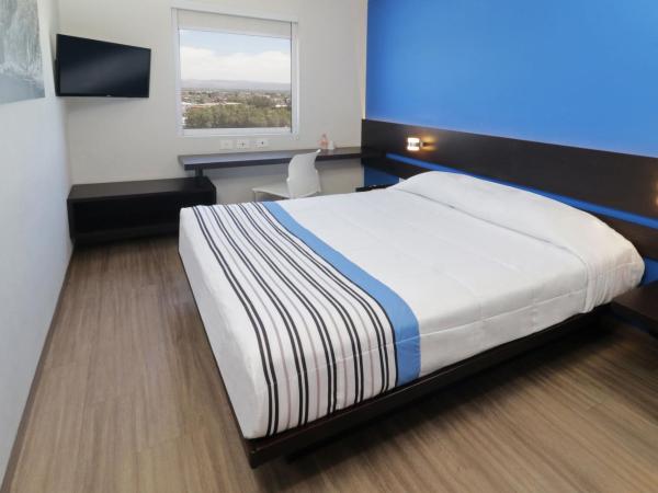 City Express Junior by Marriott Merida Altabrisa : photo 3 de la chambre chambre lit queen-size 