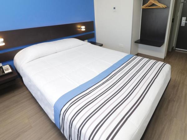 City Express Junior by Marriott Merida Altabrisa : photo 6 de la chambre chambre lit queen-size 