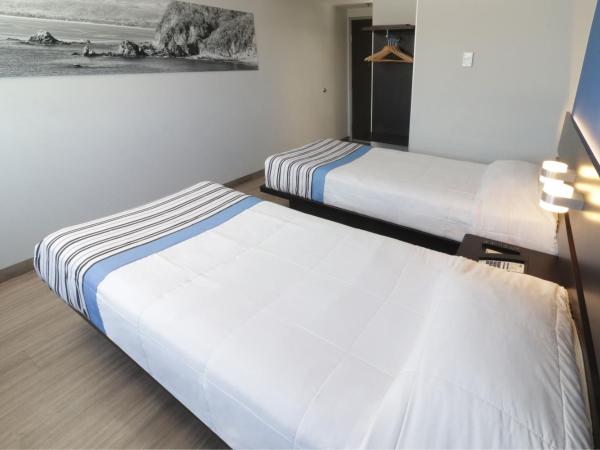 City Express Junior by Marriott Merida Altabrisa : photo 6 de la chambre chambre lits jumeaux