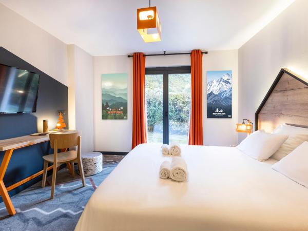 Hotel Base Camp Lodge - Albertville : photo 6 de la chambre chambre double ou lits jumeaux deluxe – vue sur jardin