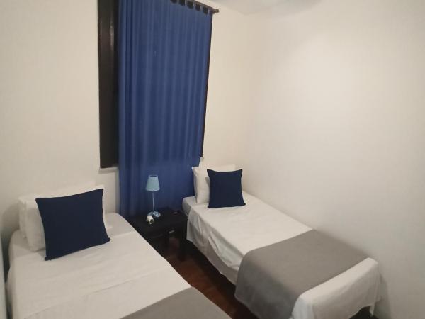 Pousada Estrela do Mar : photo 6 de la chambre chambre quadruple avec balcon