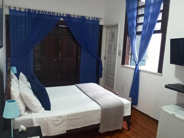 Pousada Estrela do Mar : photo 3 de la chambre chambre quadruple avec balcon