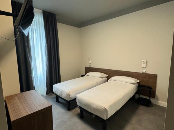 Hotel 22 Marzo : photo 1 de la chambre grande chambre double ou lits jumeaux