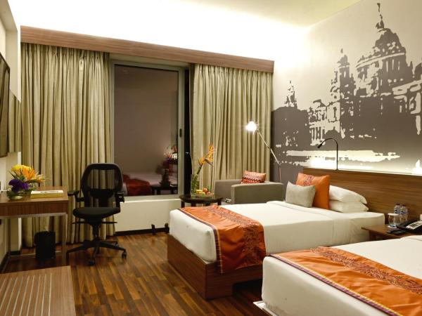 Vivanta Kolkata EM Bypass : photo 4 de la chambre chambre lits jumeaux supérieure - vue sur ville
