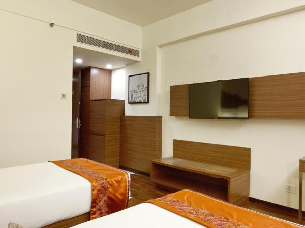 Vivanta Kolkata EM Bypass : photo 7 de la chambre chambre lits jumeaux supérieure - vue sur ville