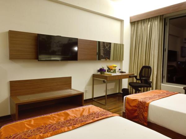 Vivanta Kolkata EM Bypass : photo 8 de la chambre chambre lits jumeaux supérieure - vue sur ville