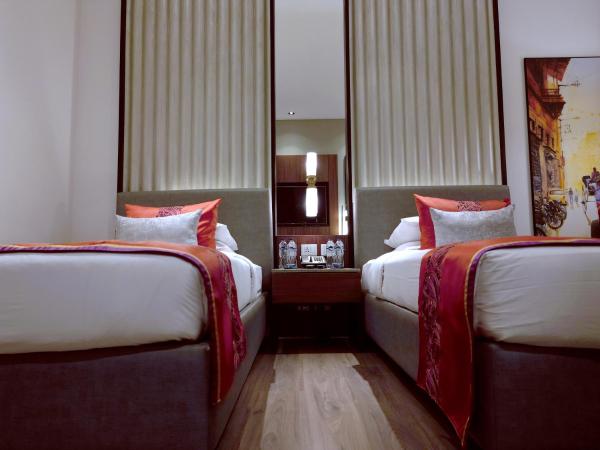 Vivanta Kolkata EM Bypass : photo 6 de la chambre chambre lits jumeaux premium - vue sur ville
