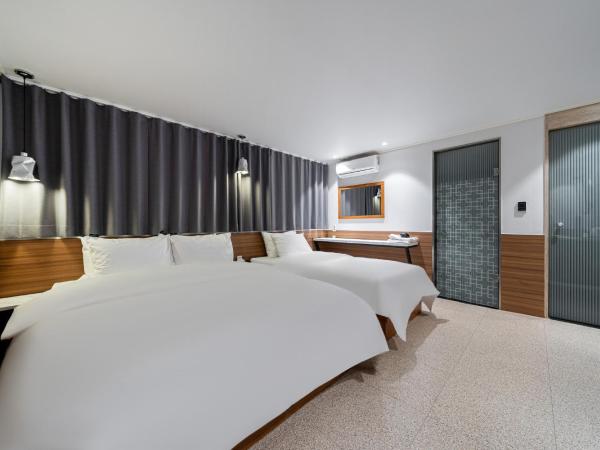 Jamsil Noblestay Hotel : photo 4 de la chambre chambre lits jumeaux