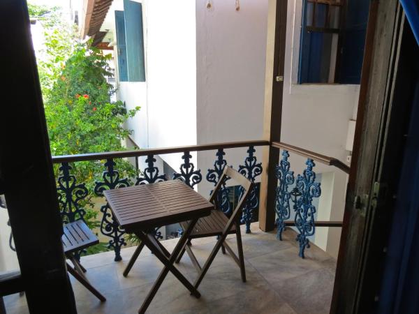 Pousada Estrela do Mar : photo 10 de la chambre chambre quadruple avec balcon 