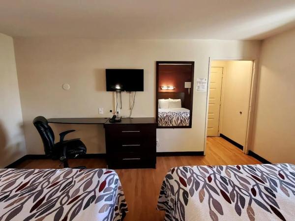Sacramento Inn & Suites : photo 3 de la chambre chambre double ou lits jumeaux deluxe - vue sur ville 