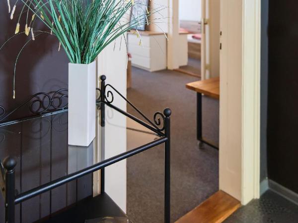 Stodolní Apartment : photo 6 de la chambre chambre quadruple Économique avec salle de bains commune