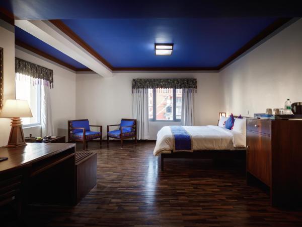 Shambaling Boutique Hotel : photo 1 de la chambre chambre lit king-size exécutive