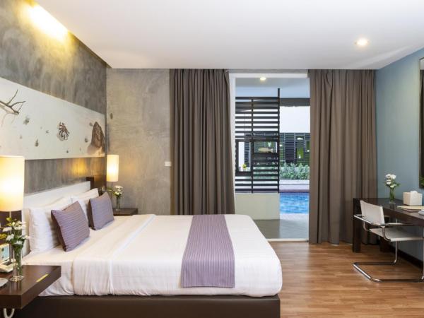 Sila at Hua Hin Serviced Apartment & Hotel : photo 3 de la chambre chambre lit king-size - vue sur piscine 