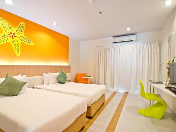 Grand Bella : photo 2 de la chambre chambre lits jumeaux de luxe avec vue sur la piscine