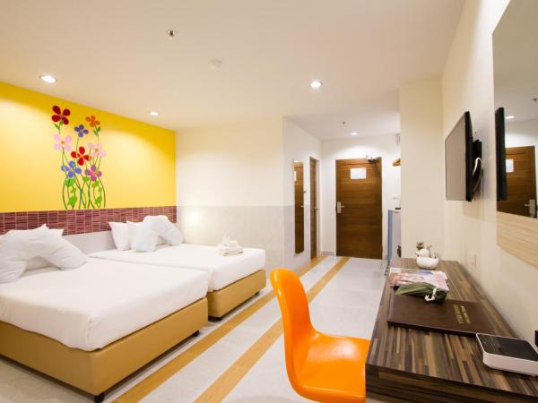 Grand Bella : photo 1 de la chambre chambre lits jumeaux de luxe avec vue sur la piscine