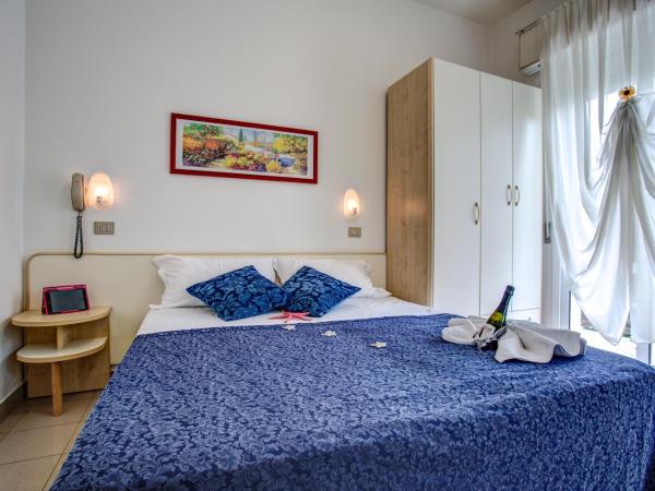 Hotel Tiziana : photo 1 de la chambre chambre double ou lits jumeaux