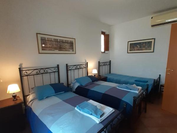 B&B La Verbena : photo 4 de la chambre chambre double ou lits jumeaux avec lit d'appoint