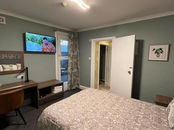 Charlotte Guest House : photo 4 de la chambre chambre quadruple
