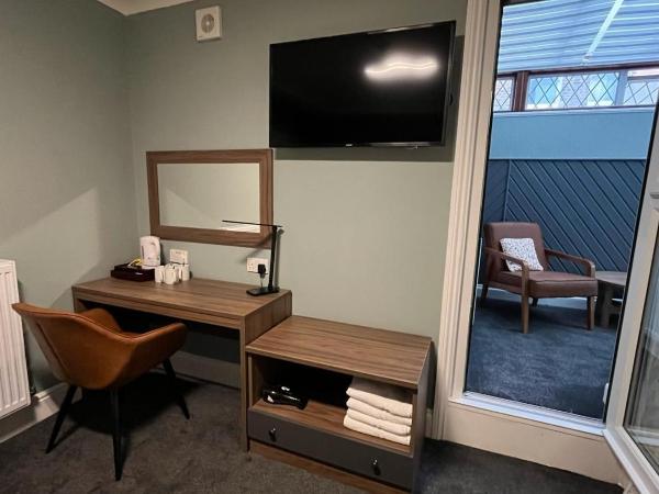 Charlotte Guest House : photo 8 de la chambre chambre quadruple