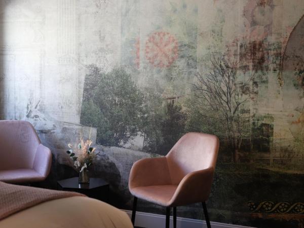 Les Trésorières : photo 2 de la chambre chambre prestige (annexe « l'orangerie »)