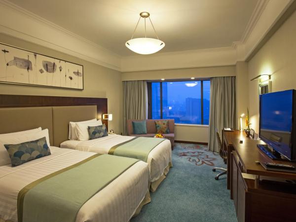 Shangri-La Qingdao - May Fourth Square : photo 9 de la chambre deluxe twin room - city wing