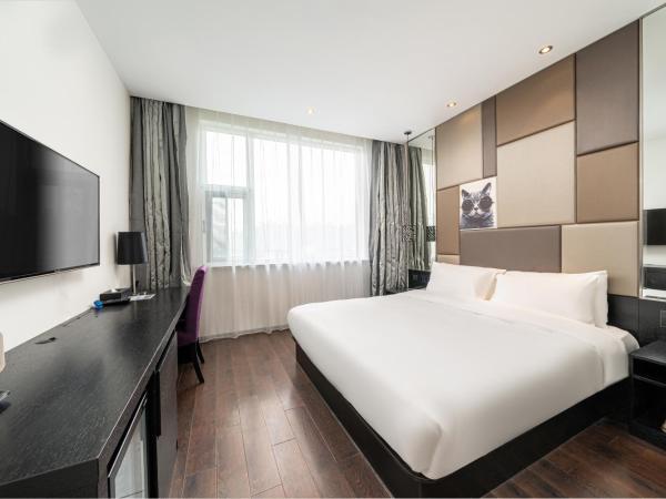 Orange Hotel Shanghai Hongqiao Airport Caoan Road Branch - Free Hongqiao Airport & Hongqiao Train station Shuttle Bus : photo 5 de la chambre chambre lit queen-size deluxe