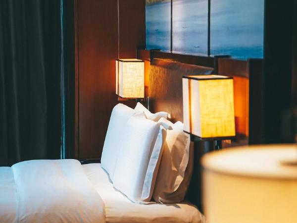 DoubleTree By Hilton Ningbo Beilun : photo 4 de la chambre chambre lit king-size deluxe - vue sur jardin