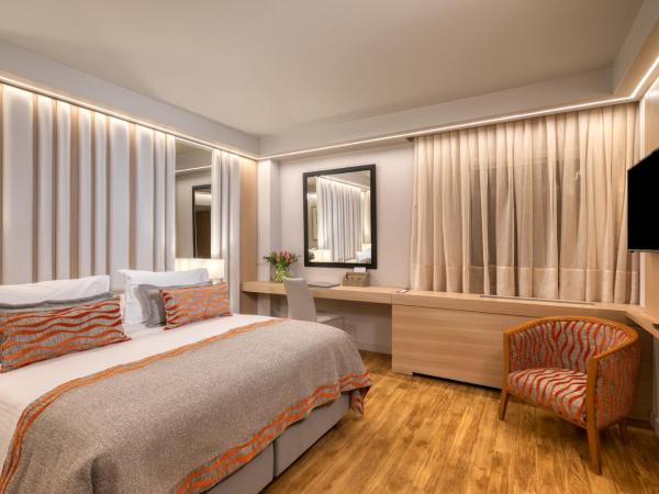 Divani Caravel : photo 1 de la chambre chambre triple essential