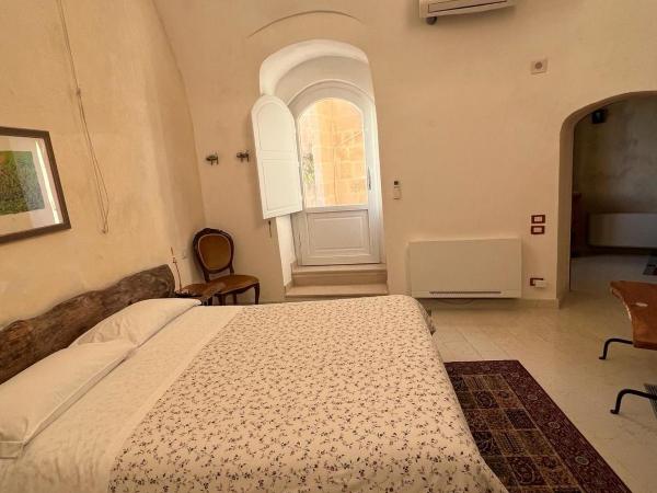 Locus Amoenus : photo 10 de la chambre chambre lit king-size avec baignoire spa