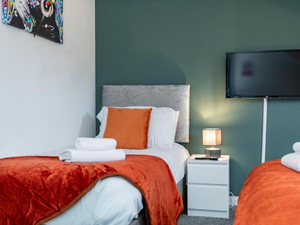 Castlereagh guest House : photo 5 de la chambre chambre triple Économique avec salle de bains commune