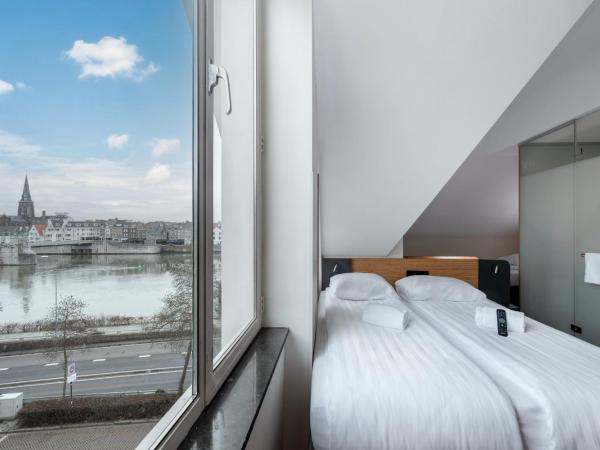 easyHotel Maastricht City Centre : photo 1 de la chambre petite chambre familiale quadruple