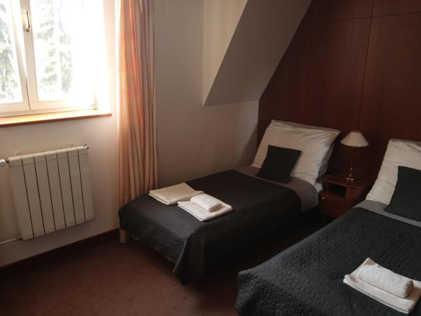 Retro Hotel Villa Ostrava : photo 6 de la chambre chambre double ou lits jumeaux