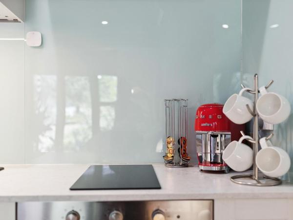 Haven Studio Hideaway near Airport : photo 6 de la chambre studio lit queen-size de luxe