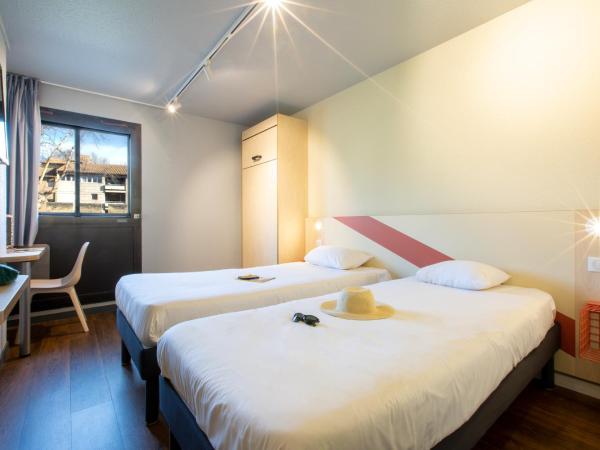 ibis budget Avignon Centre : photo 5 de la chambre chambre triple avec 3 lits simples