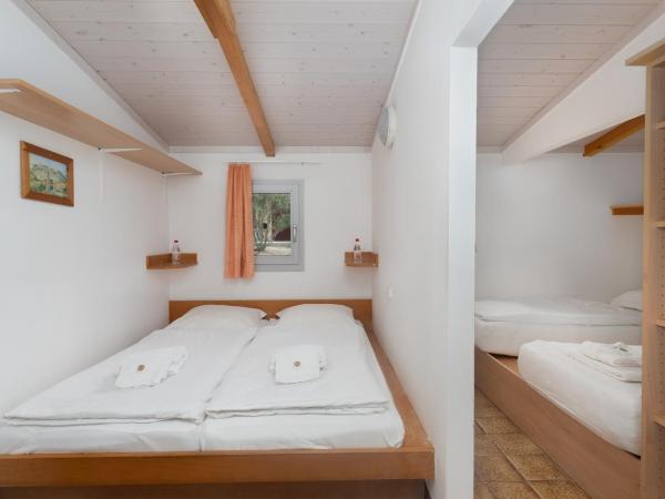 Feriendorf zum störrischen Esel : photo 2 de la chambre cottage