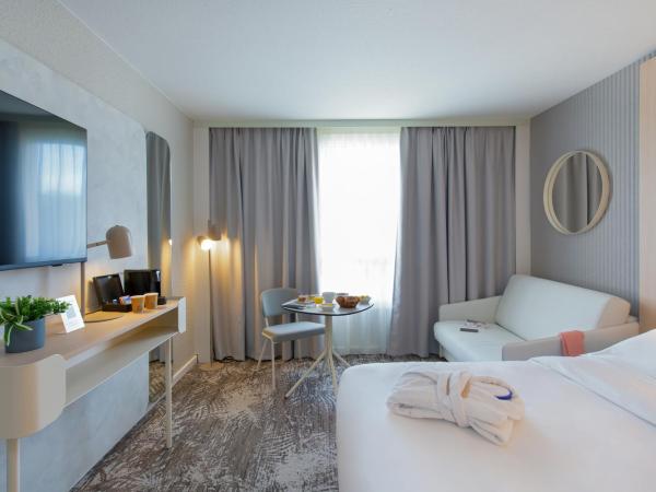 Novotel Aix-en-Provence Pont de L'Arc : photo 3 de la chambre chambre exécutive avec 1 lit double et 1 canapé-lit simple