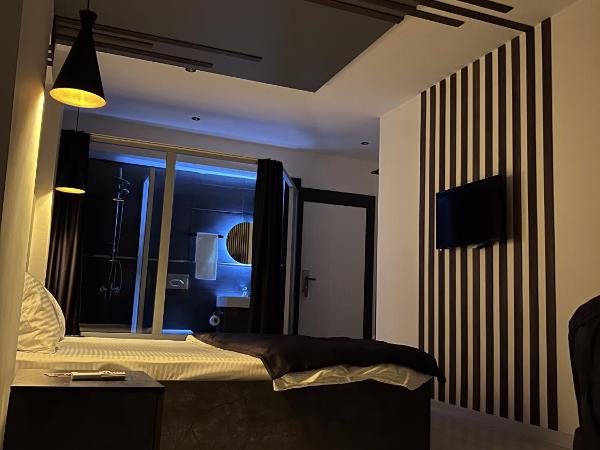 womco butik otel : photo 1 de la chambre chambre deluxe (2 adultes + 1 enfant)