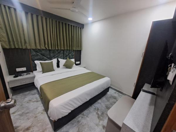 HOTEL AKASH : photo 1 de la chambre chambre double deluxe (2 adultes + 1 enfant)