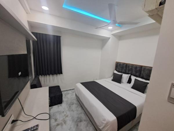 HOTEL AKASH : photo 2 de la chambre chambre double deluxe (2 adultes + 1 enfant)
