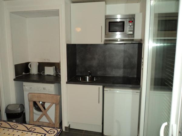 Résidence Monte d'Oro : photo 2 de la chambre studio avec vue sur jardin