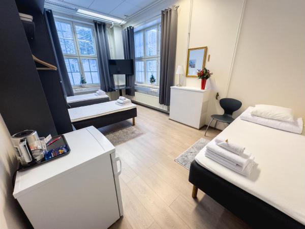 Hostel Hermanni : photo 1 de la chambre chambre triple avec salle de bains commune