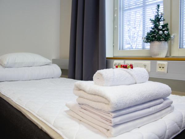 Hostel Hermanni : photo 4 de la chambre chambre triple avec salle de bains commune