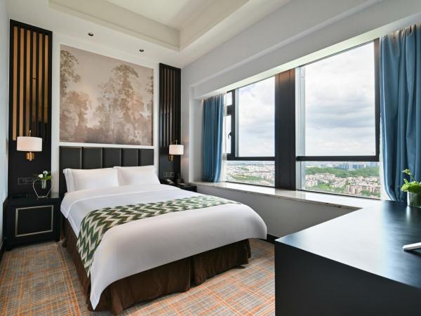 Guangzhou Pan Yu President Hotel : photo 2 de la chambre chambre lit queen-size