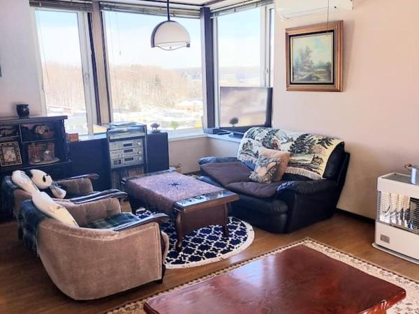 川と森の静かな街に朝陽の見える部屋 無料駐車場 : photo 3 de la chambre chambre quadruple avec salle de bains commune