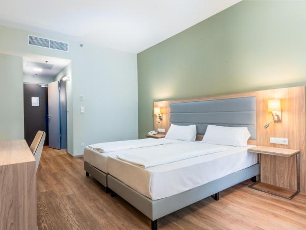 Akeah Verdi Budapest : photo 2 de la chambre chambre deluxe double ou lits jumeaux