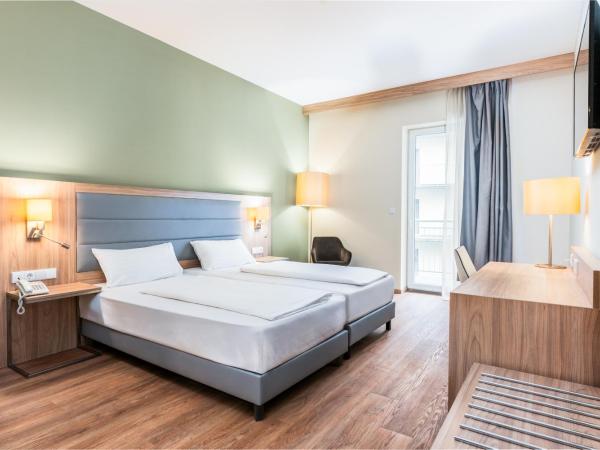 Akeah Verdi Budapest : photo 1 de la chambre chambre deluxe double ou lits jumeaux