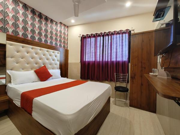 Hotel Dream Palace Residency - Near LBS Marg Kural West : photo 1 de la chambre chambre deluxe